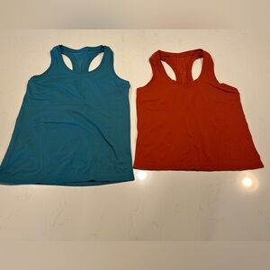2 Athleta Momentum seamless tank tops size medium